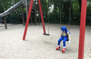 Littel boy, alone, playground